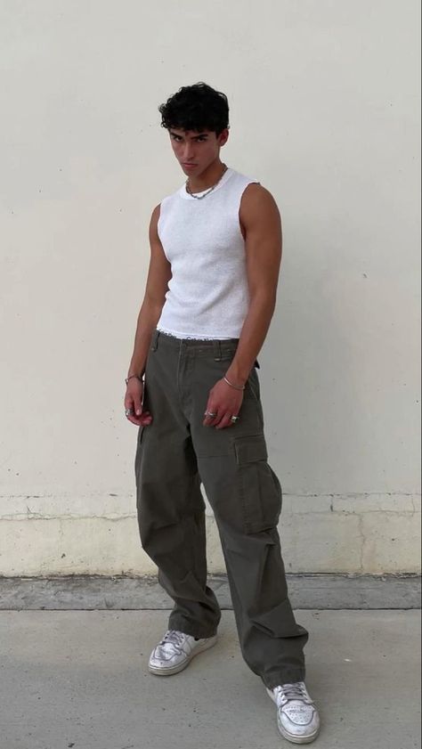 White tank top paired with olive green cargo pants